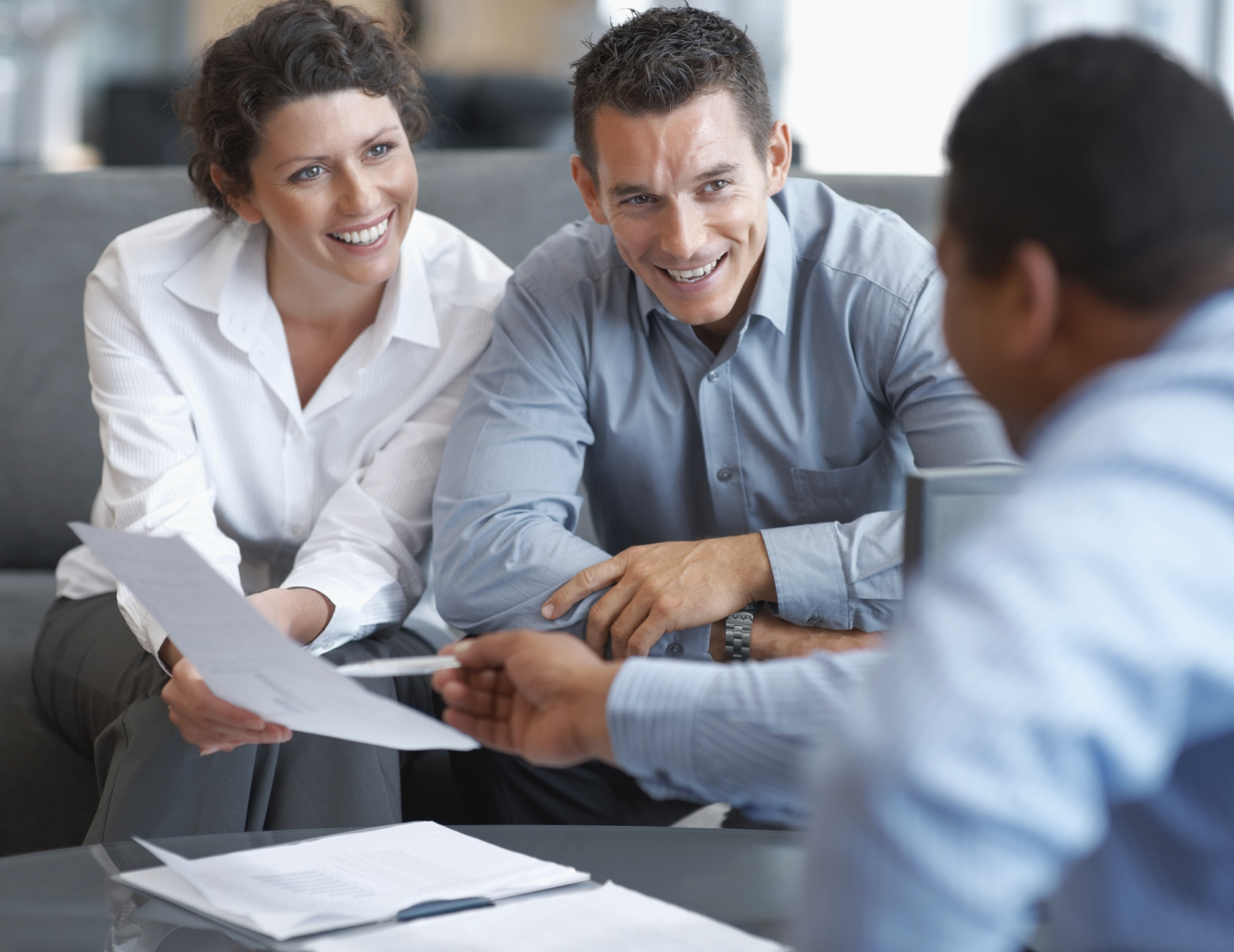 People reviewing a retirement plan document